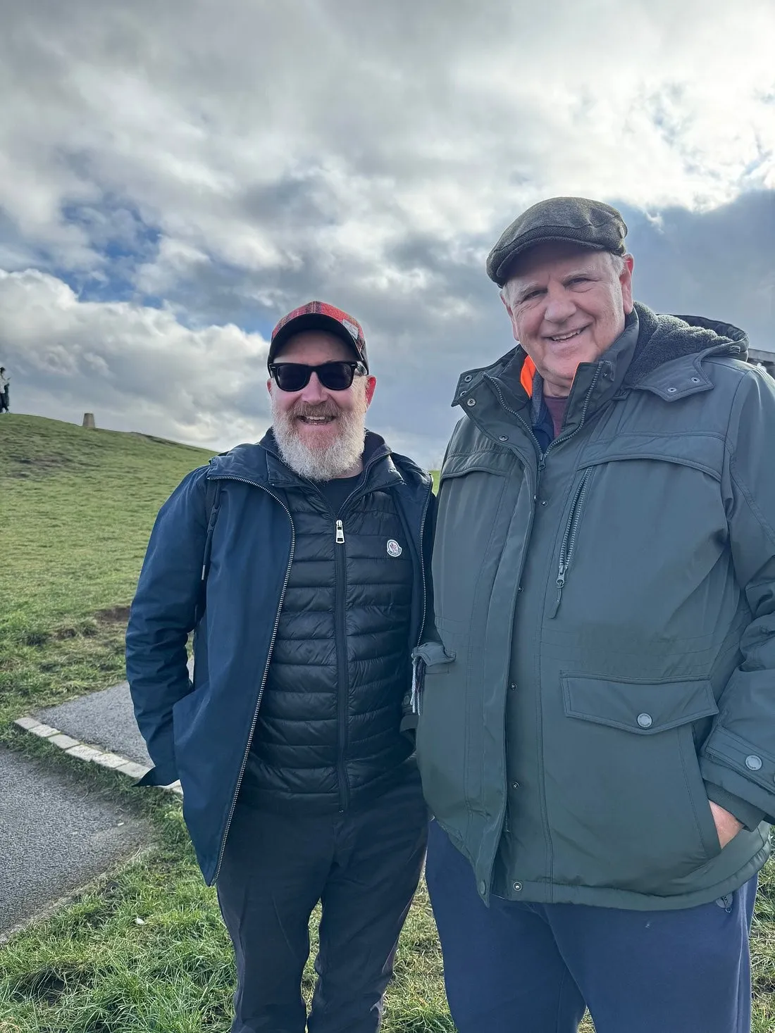 One of our guides with a guest on a hilltop walk